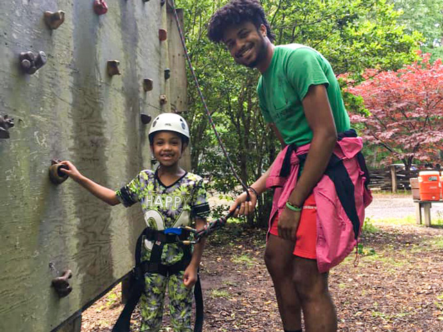 Ready to climb the rock wall